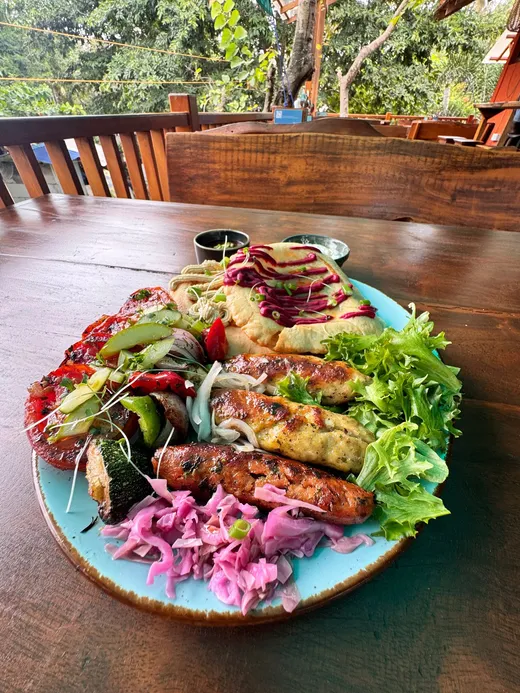 Skewers with vegetables, flatbread and dips at Maha Mezze, Hiriketiya